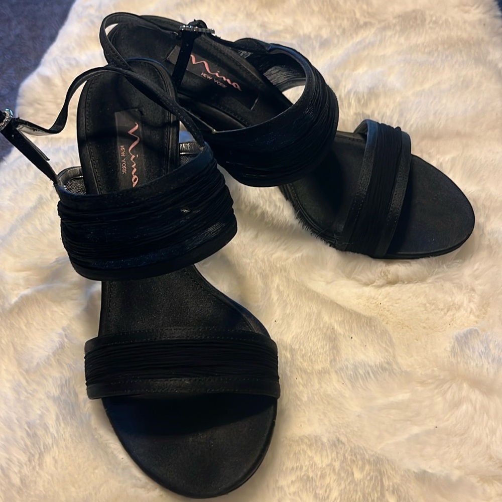 Black open heel and open toe heels.